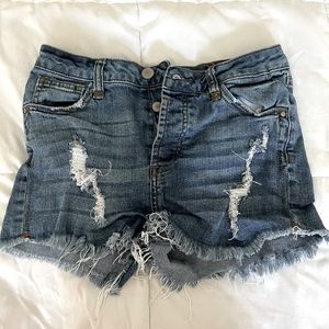 Medium wash distressed jean shorts